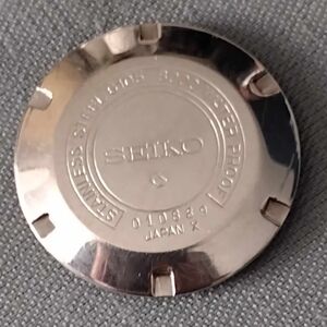 GENUINE CASE BACK COVER SEIKO SLIM 6105-8000 DATED JANUARY 1970.